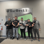 A group of men holding guns, ready for some high-energy fun—perfect for those seeking exciting things to do near Princeton NJ.